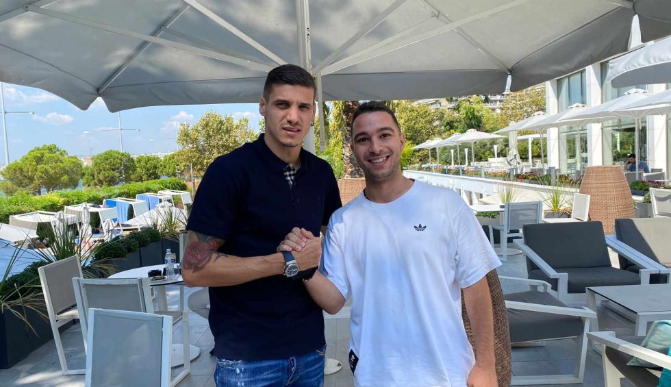 A generic square placeholder image with rounded corners in a figure.