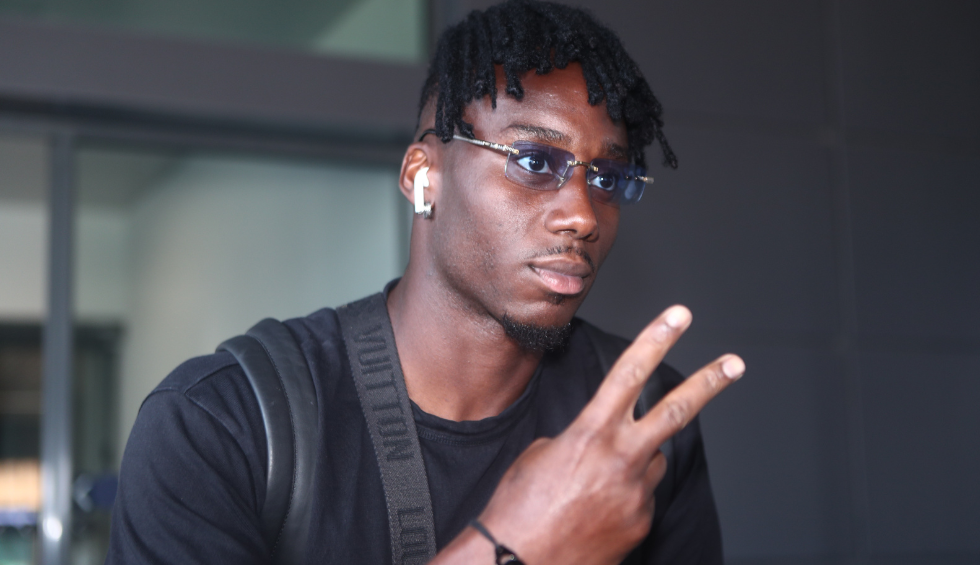 A generic square placeholder image with rounded corners in a figure.