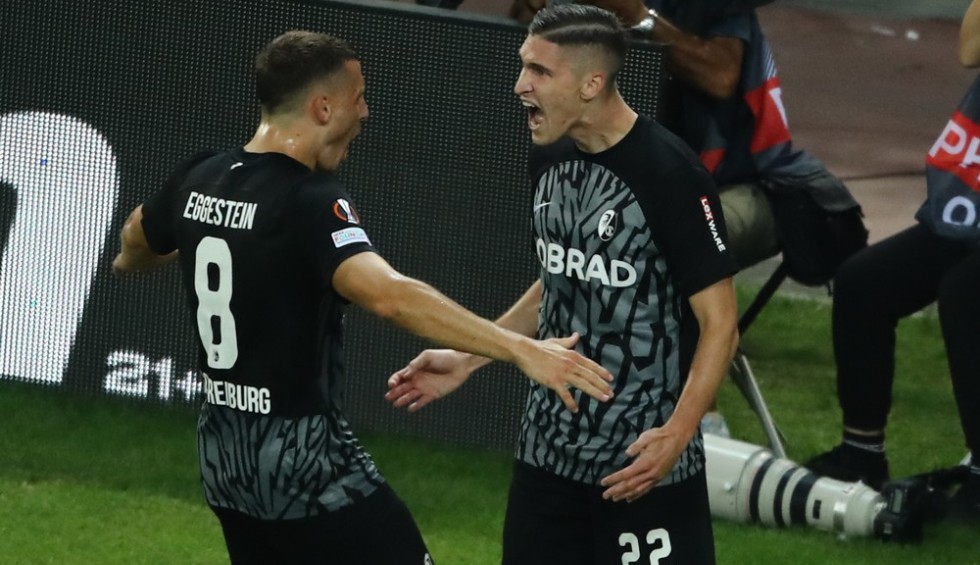 A generic square placeholder image with rounded corners in a figure.