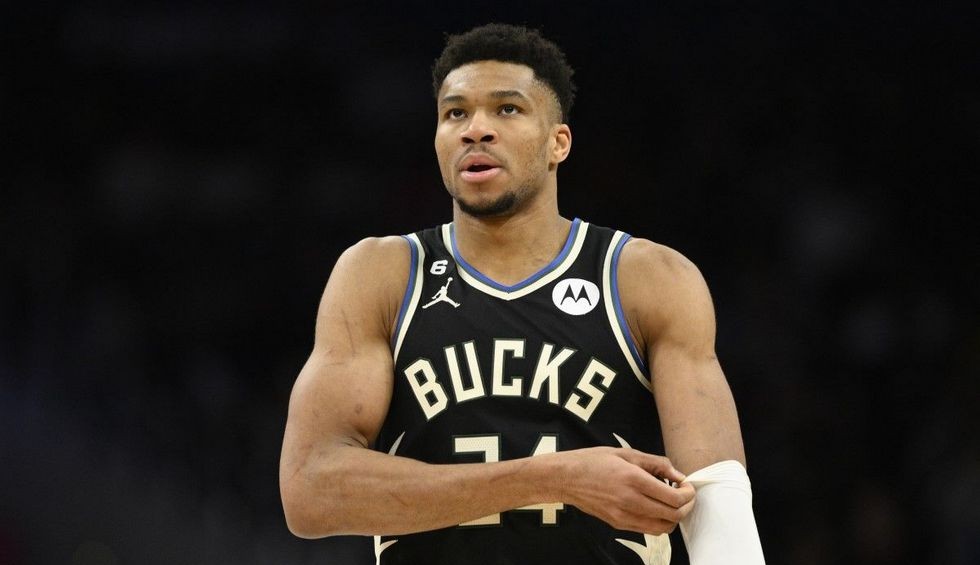 A generic square placeholder image with rounded corners in a figure.