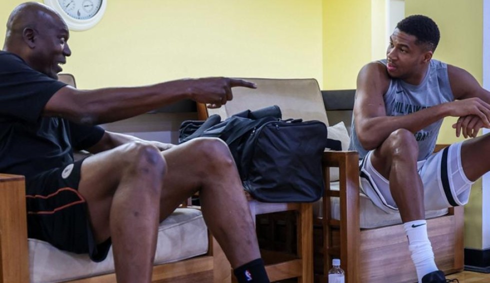 A generic square placeholder image with rounded corners in a figure.