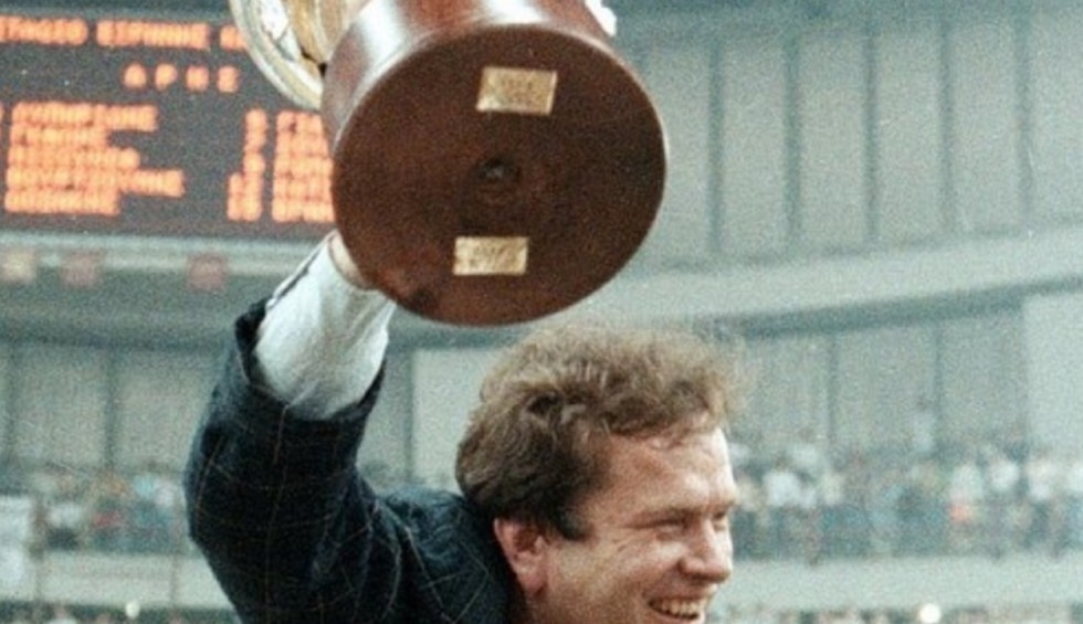 A generic square placeholder image with rounded corners in a figure.