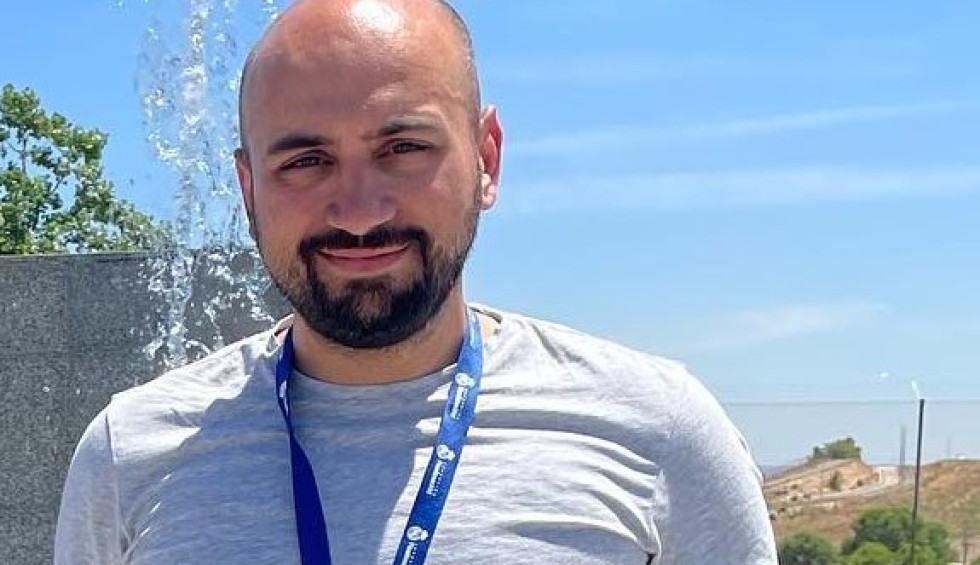 A generic square placeholder image with rounded corners in a figure.