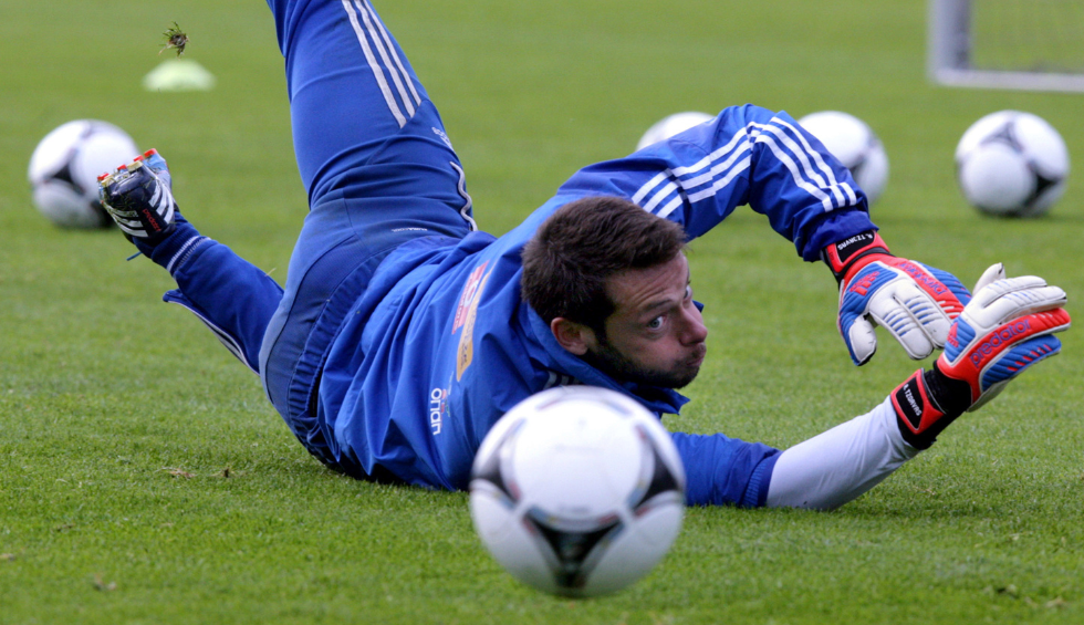 A generic square placeholder image with rounded corners in a figure.