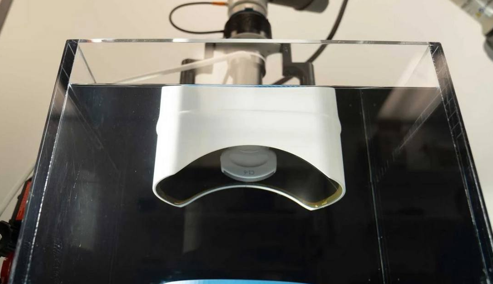 A generic square placeholder image with rounded corners in a figure.