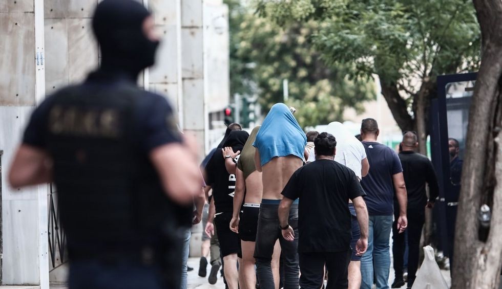 A generic square placeholder image with rounded corners in a figure.