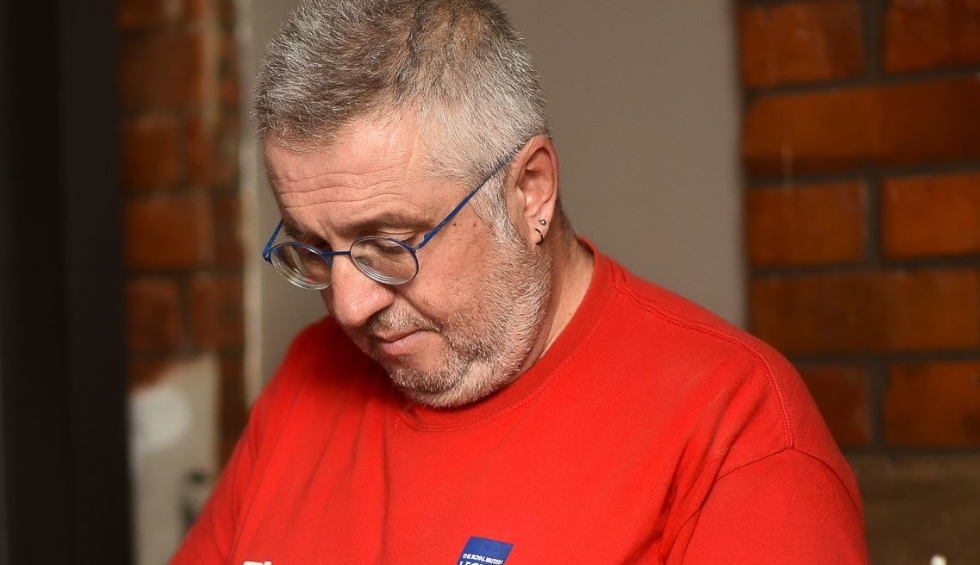 A generic square placeholder image with rounded corners in a figure.