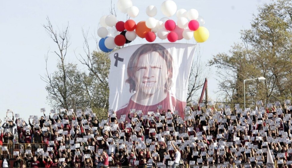 A generic square placeholder image with rounded corners in a figure.