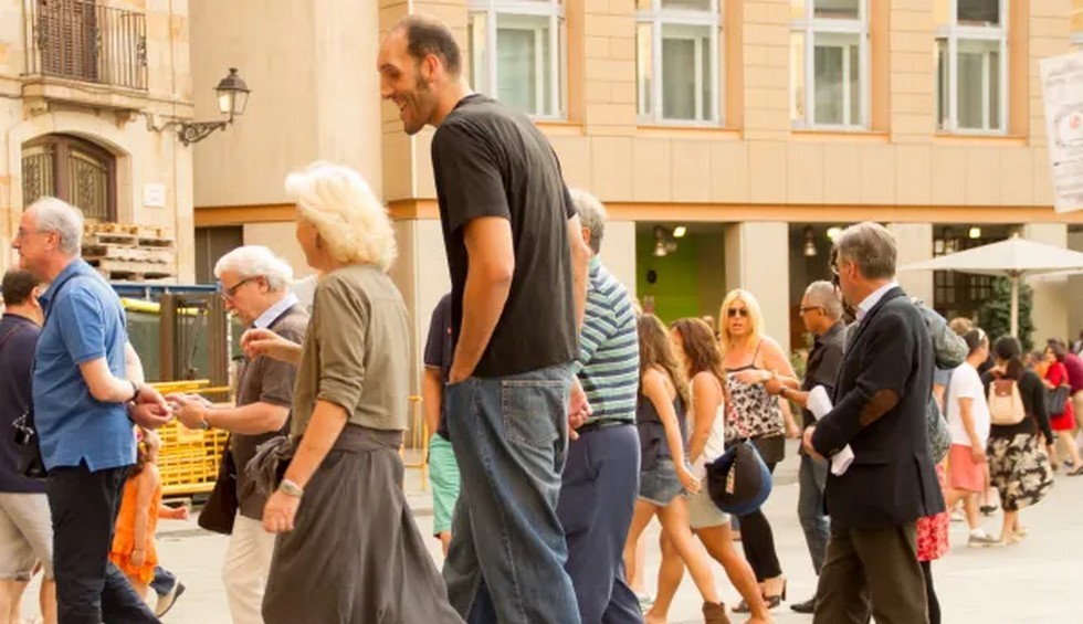 A generic square placeholder image with rounded corners in a figure.