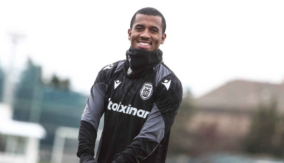 A generic square placeholder image with rounded corners in a figure.