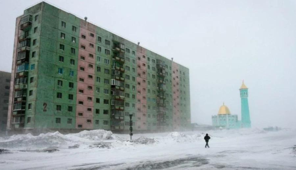 A generic square placeholder image with rounded corners in a figure.