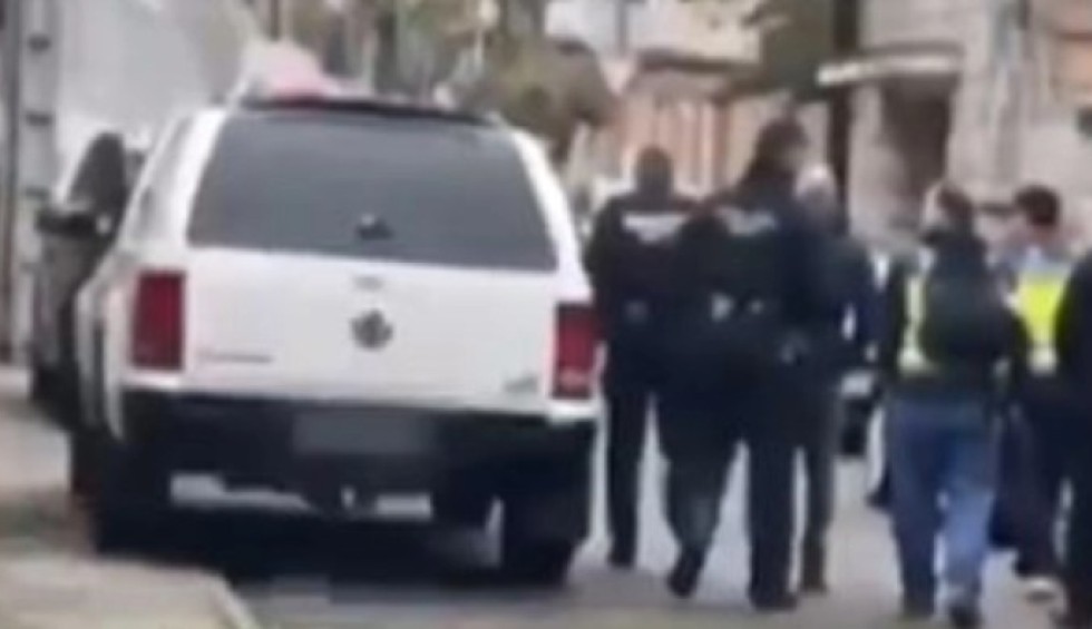 A generic square placeholder image with rounded corners in a figure.