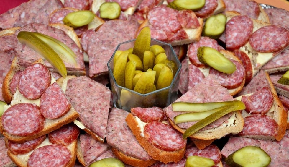 A generic square placeholder image with rounded corners in a figure.