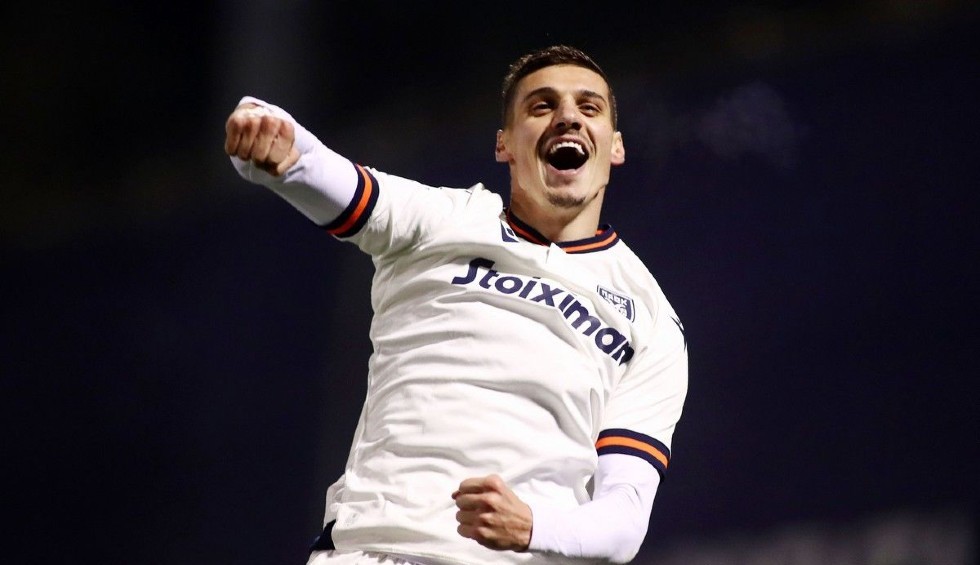 A generic square placeholder image with rounded corners in a figure.