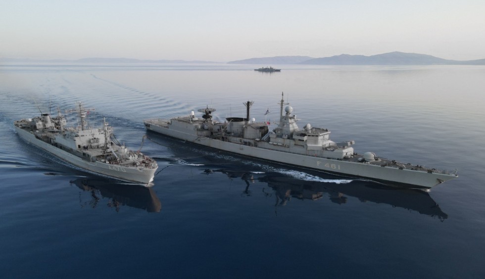 A generic square placeholder image with rounded corners in a figure.