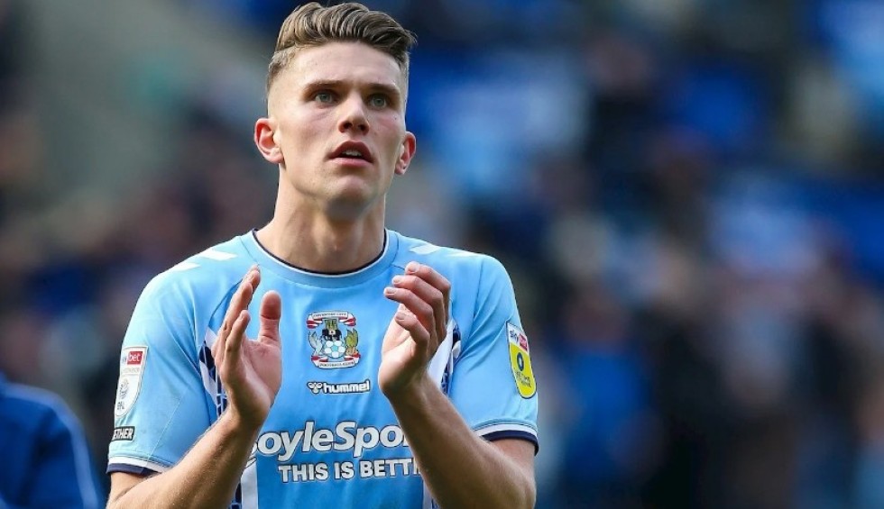 A generic square placeholder image with rounded corners in a figure.