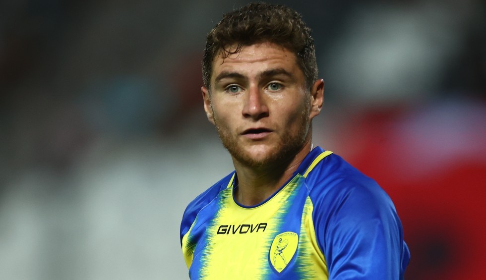 A generic square placeholder image with rounded corners in a figure.