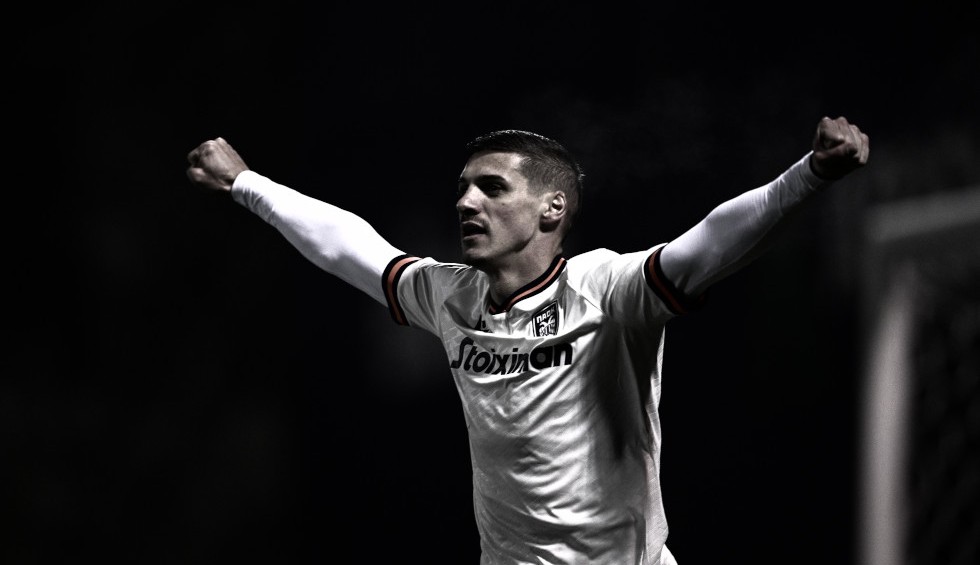 A generic square placeholder image with rounded corners in a figure.