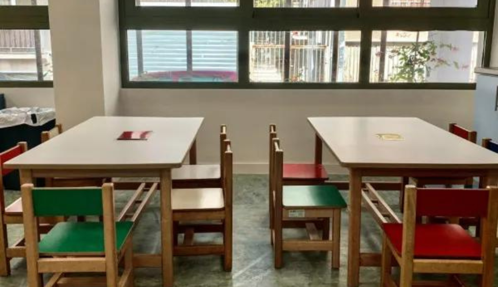 A generic square placeholder image with rounded corners in a figure.