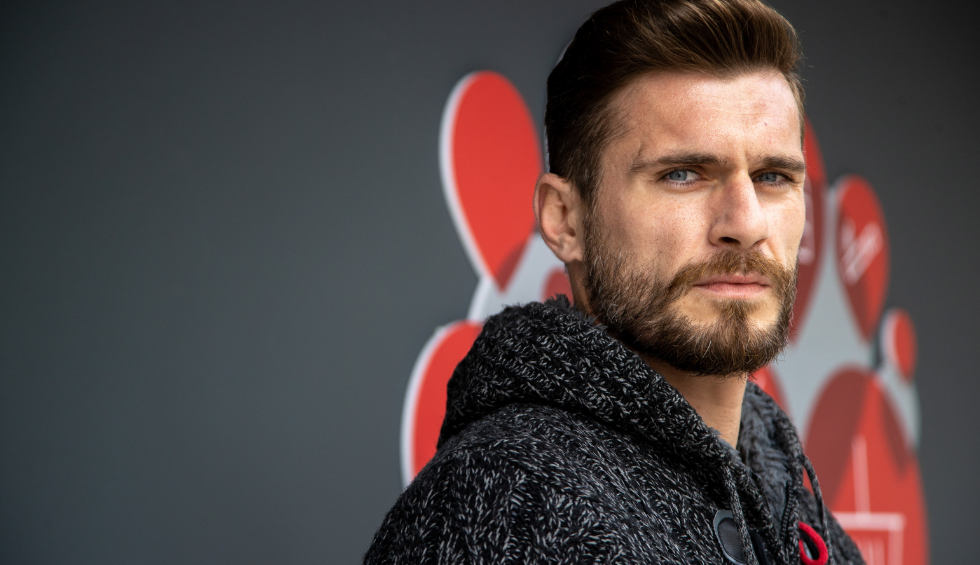 A generic square placeholder image with rounded corners in a figure.