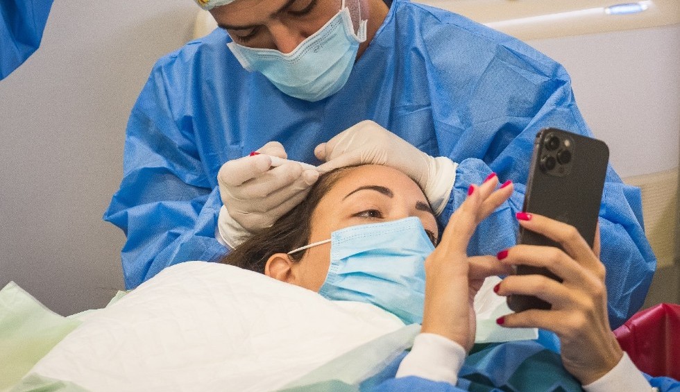 A generic square placeholder image with rounded corners in a figure.