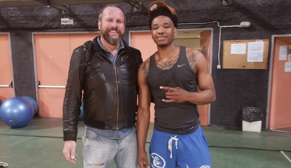 A generic square placeholder image with rounded corners in a figure.