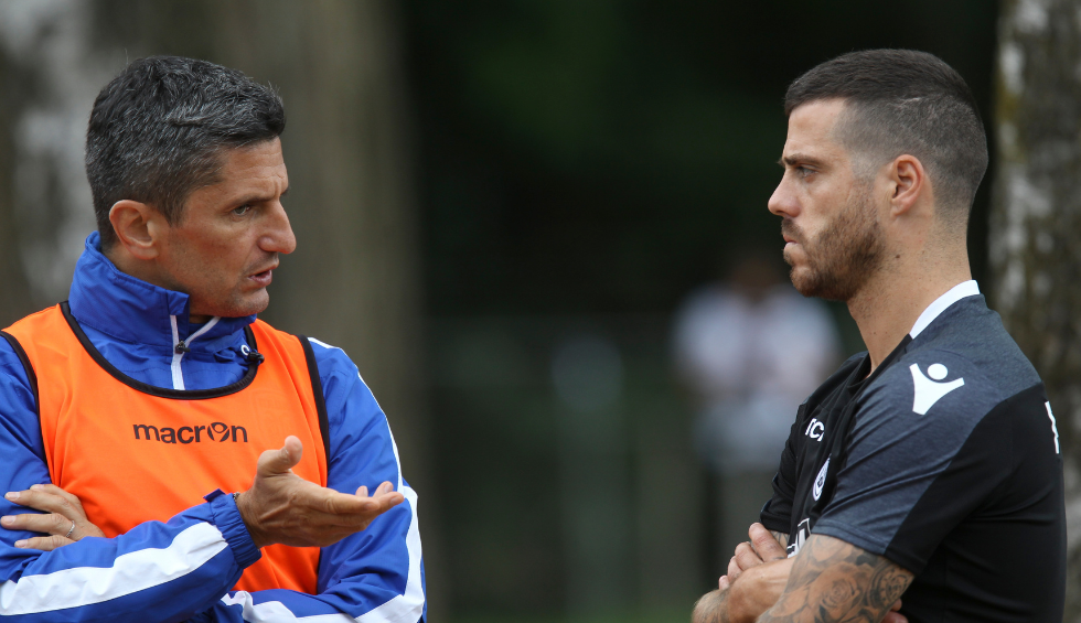 A generic square placeholder image with rounded corners in a figure.