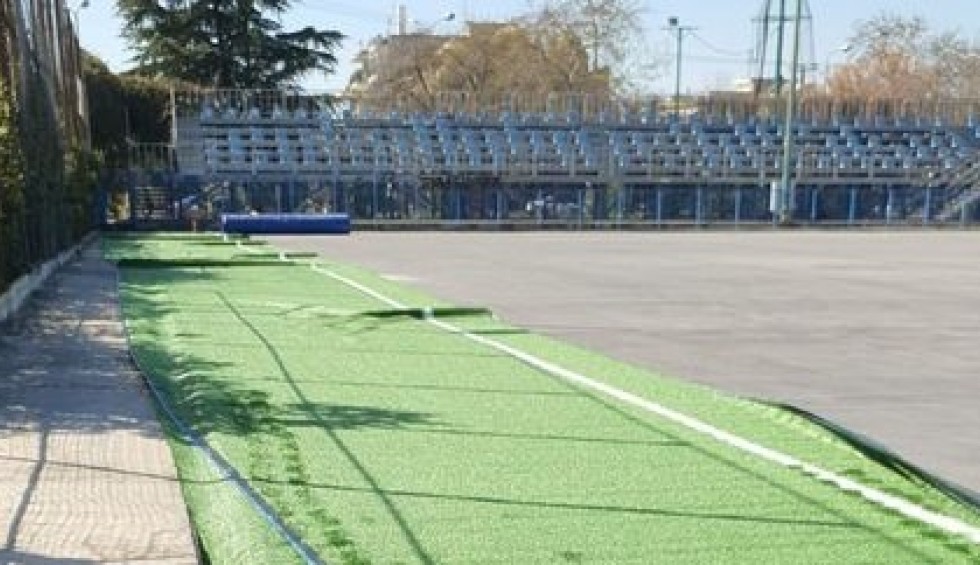 A generic square placeholder image with rounded corners in a figure.