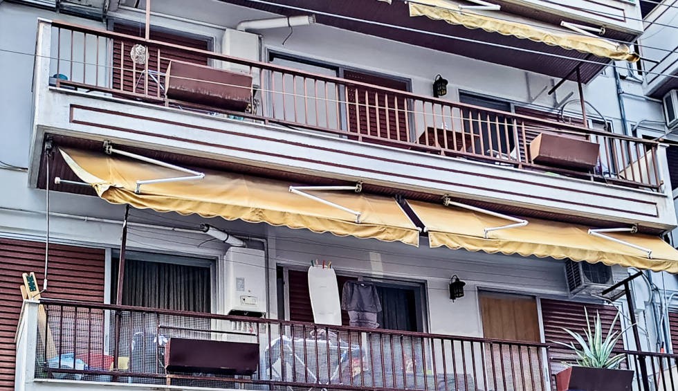 A generic square placeholder image with rounded corners in a figure.