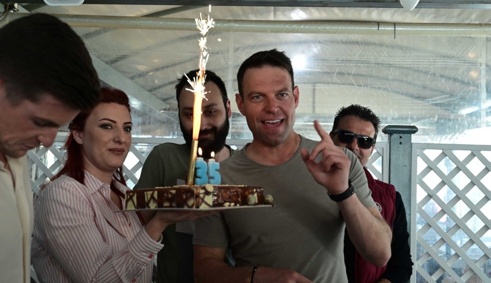 A generic square placeholder image with rounded corners in a figure.