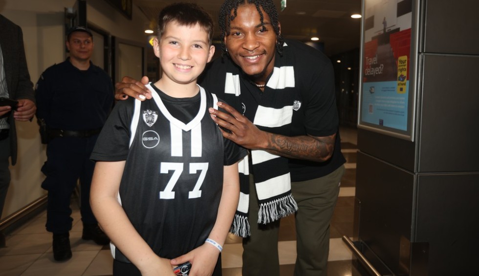 A generic square placeholder image with rounded corners in a figure.