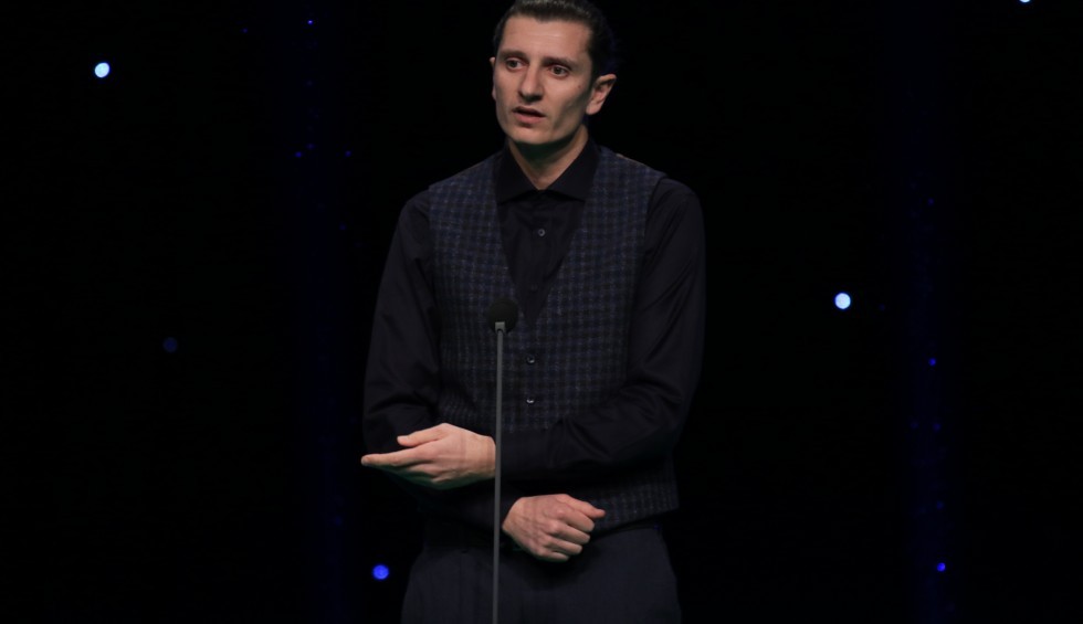 A generic square placeholder image with rounded corners in a figure.