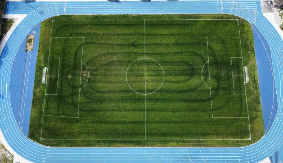 A generic square placeholder image with rounded corners in a figure.