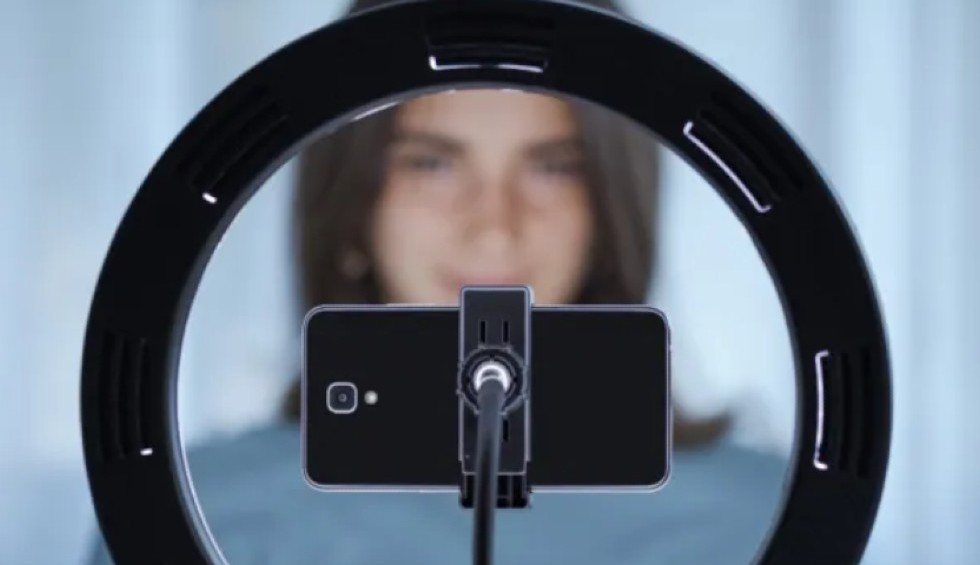 A generic square placeholder image with rounded corners in a figure.