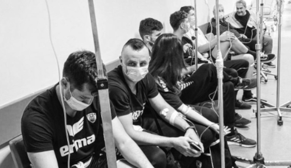 A generic square placeholder image with rounded corners in a figure.