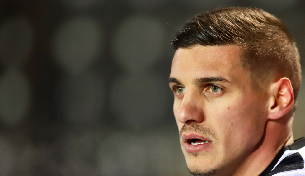 A generic square placeholder image with rounded corners in a figure.