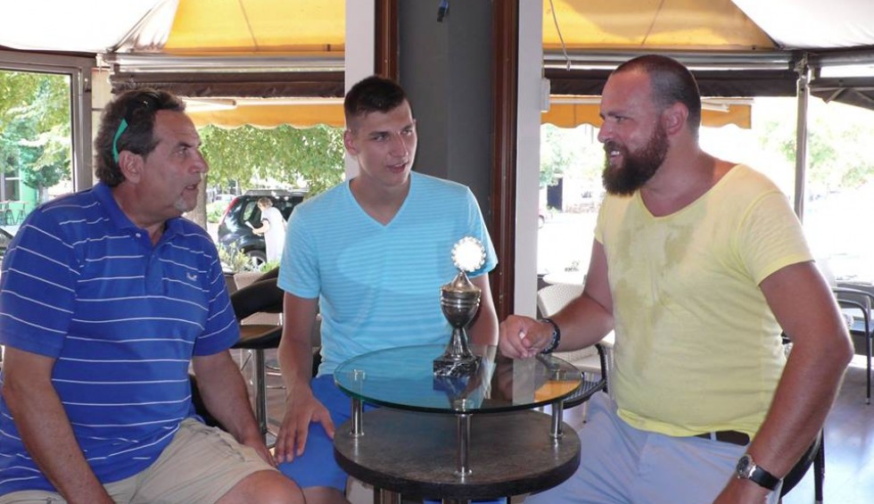 A generic square placeholder image with rounded corners in a figure.