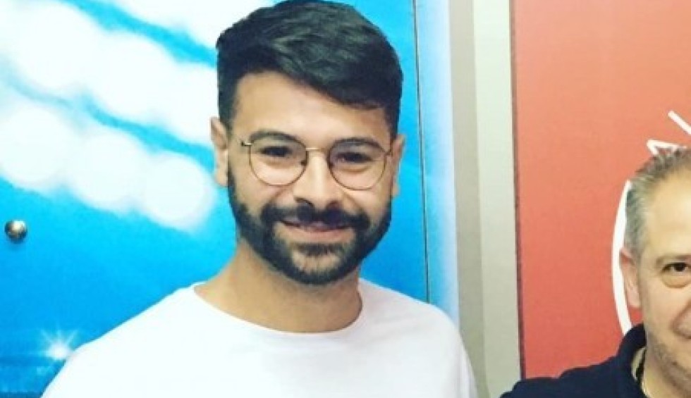 A generic square placeholder image with rounded corners in a figure.