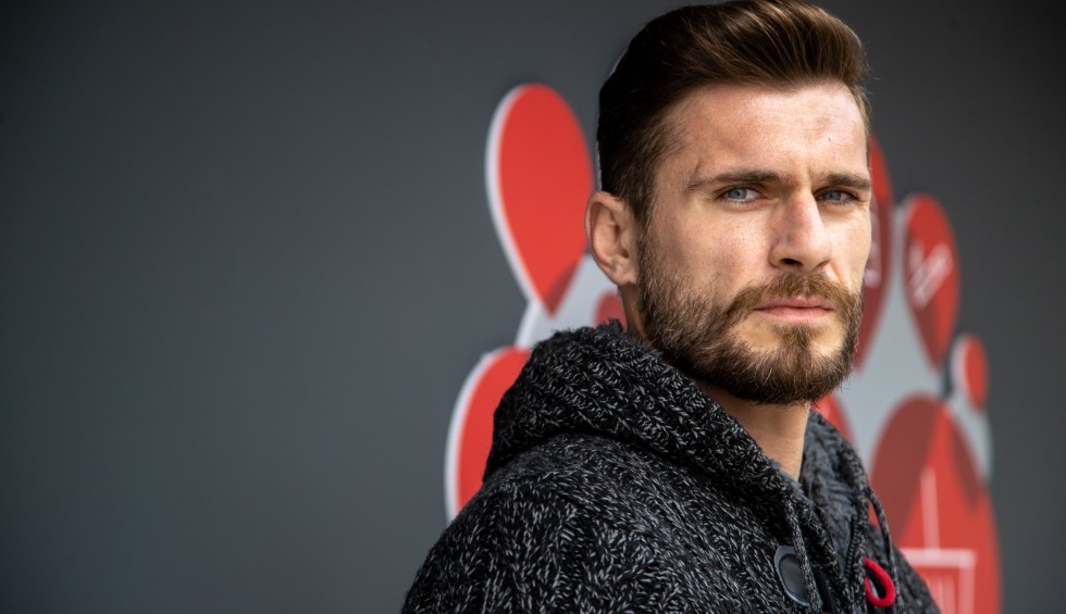 A generic square placeholder image with rounded corners in a figure.