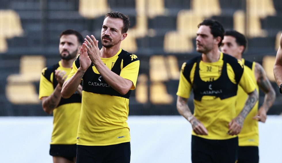 A generic square placeholder image with rounded corners in a figure.