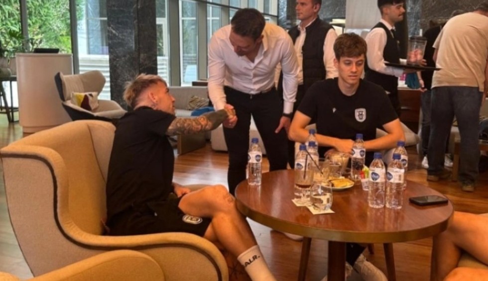 A generic square placeholder image with rounded corners in a figure.