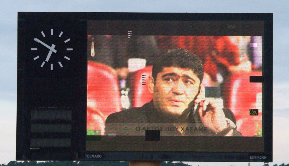 A generic square placeholder image with rounded corners in a figure.