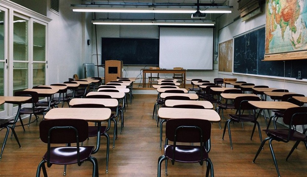 A generic square placeholder image with rounded corners in a figure.