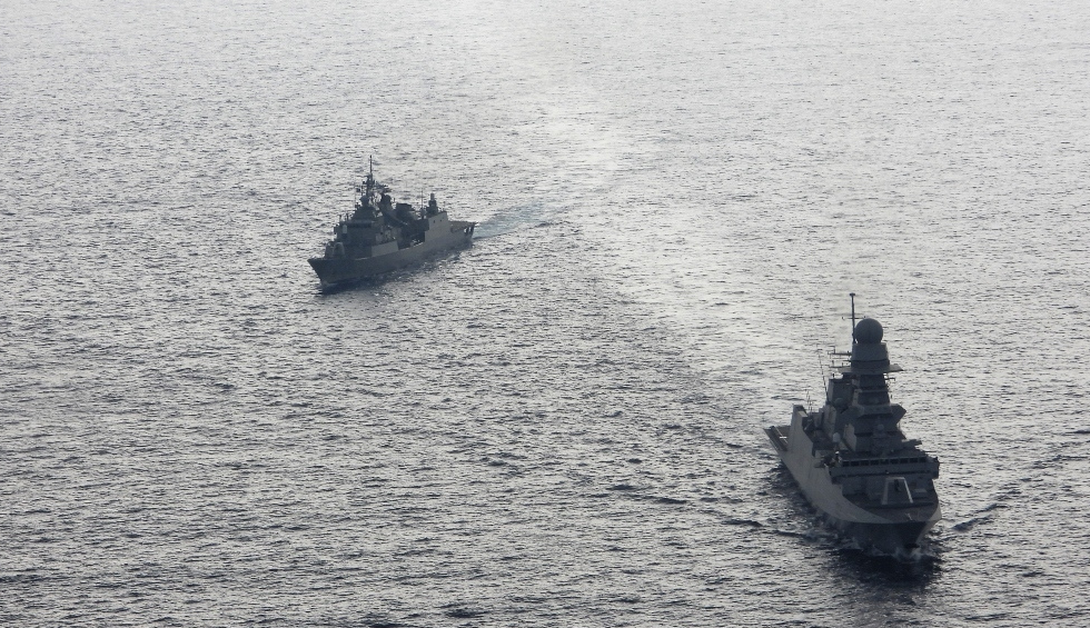 A generic square placeholder image with rounded corners in a figure.