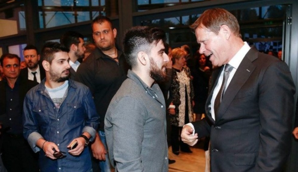 A generic square placeholder image with rounded corners in a figure.