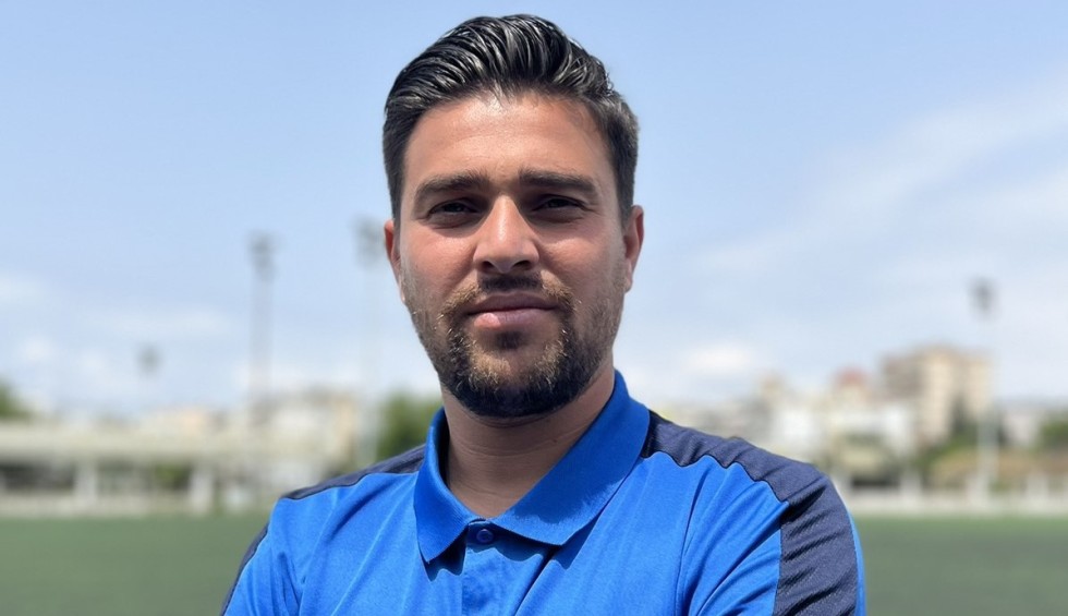 A generic square placeholder image with rounded corners in a figure.