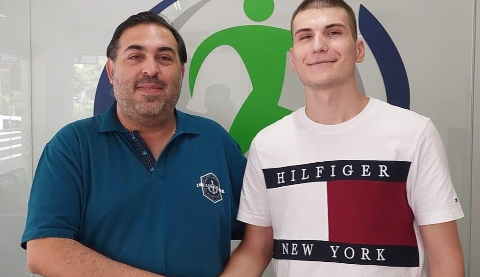 A generic square placeholder image with rounded corners in a figure.