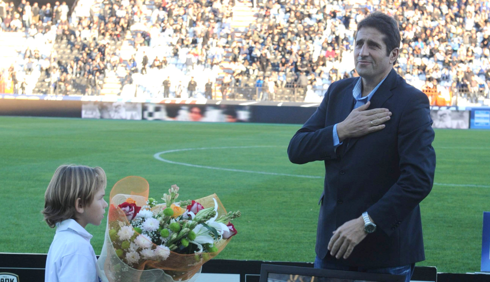 A generic square placeholder image with rounded corners in a figure.