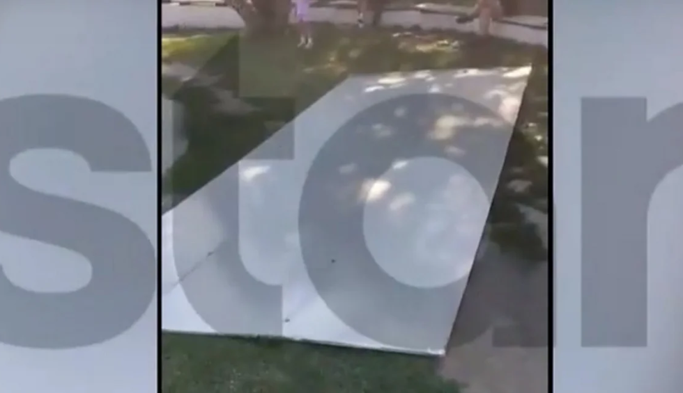 A generic square placeholder image with rounded corners in a figure.