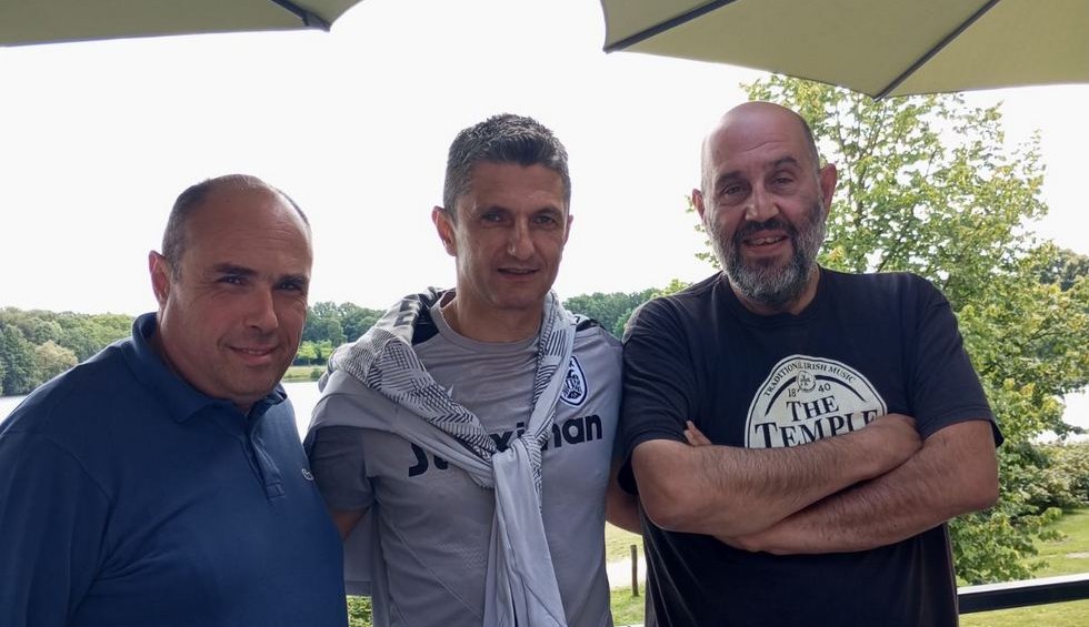 A generic square placeholder image with rounded corners in a figure.